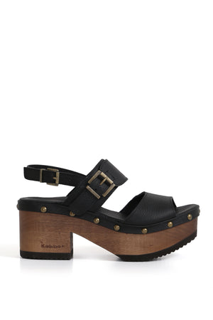 BUA Etiopía Texas Negro, sandalia artesanal con plataforma de 8 cm en madera tepa. Diseño de cuero liso con correas ajustables mediante hebillas. Imagen vista superior sobre fondo blanco. Hecho a mano en Villarrica. Kebba: tradición y herencia en tus manoS