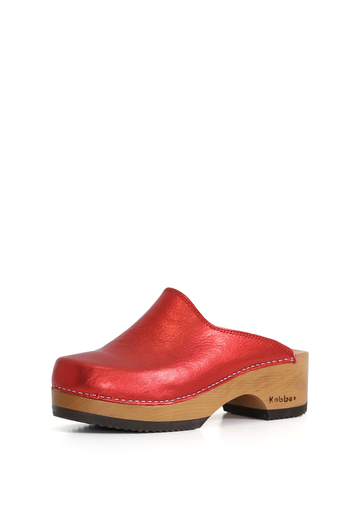 Zuecos Kebba oferta en cuero rojo con textura floater y planta de madera