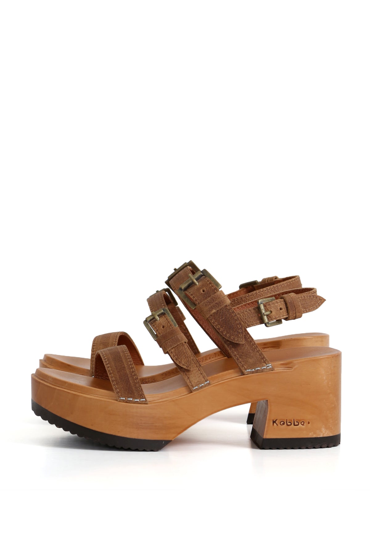 	1.	Zuecos de mujer para vestir color café con planta Pájaro y correas metálicas.
